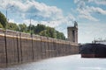 The Moscow-Volga River Canal. Black ship in the lock Royalty Free Stock Photo